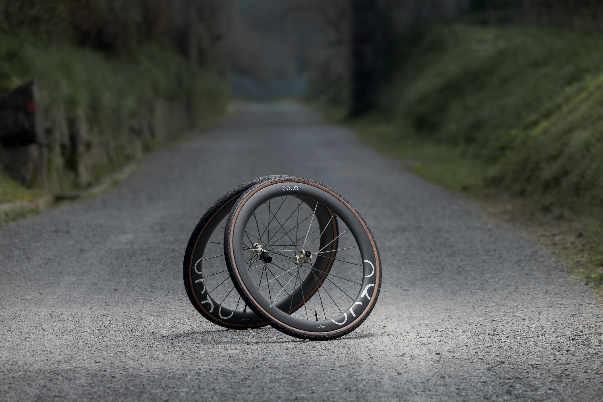 OQUO carbon wheelset on a quiet country road
